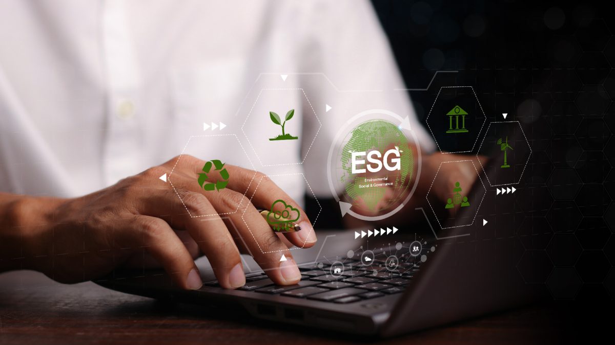 Environmental Social Governance (ESG) concept. A person working on their computer to promote a sustainable world.